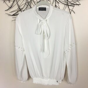 Sheer bow tie neck pearl blouse. Designer. White